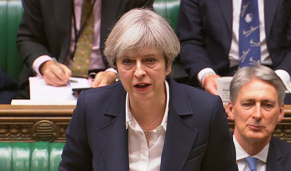 Britain's Prime Minister Theresa May speaks in Parliament as she announces that she has sent the letter to trigger the process of leaving the European Union in London, March 29, 2017. Parliament TV handout via REUTERS (Foto: Paulo Emílio) Britain's Prime Minister Theresa May speaks in Parliament as she announces that she has sent the letter to trigger the process of leaving the European Union in London, March 29, 2017. Parliament TV handout via REUTERS