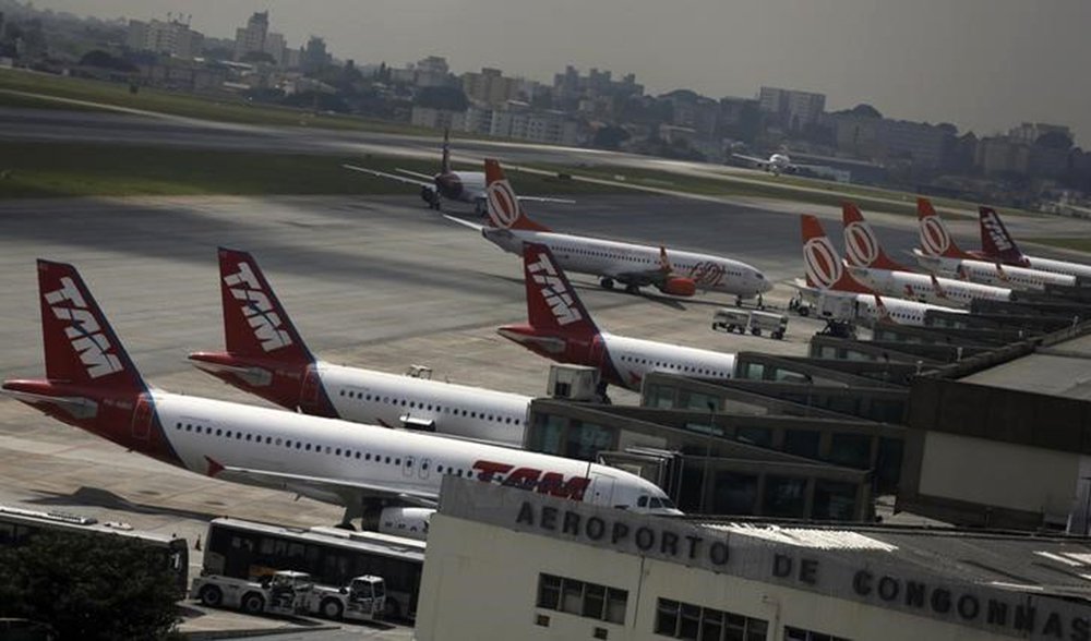 Em foto de arquivo, aviões da Gol e da TAM são vistos no aeroporto de Congonhas, em São Paulo 17/1/2014 REUTERS/Nacho Doce (Foto: Aquiles Lins) Em foto de arquivo, aviões da Gol e da TAM são vistos no aeroporto de Congonhas, em São Paulo 17/1/2014 REUTERS/Nacho Doce