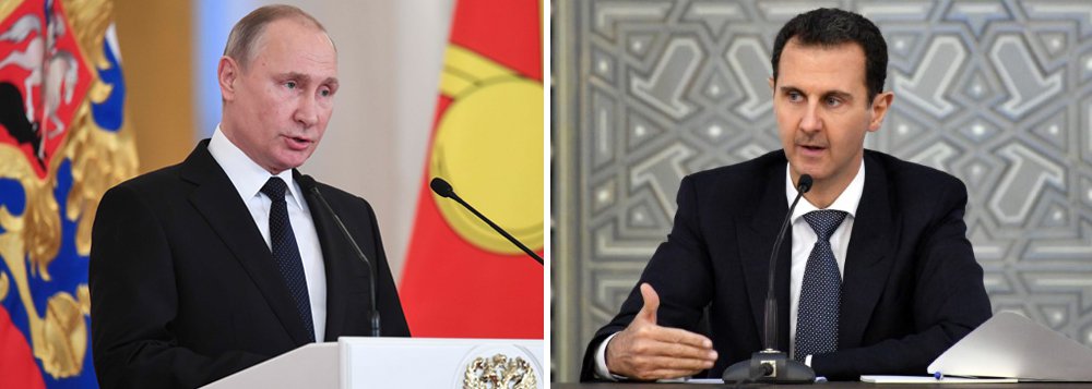 Presidente russo Vladimir Putin disse ao seu colega sírio, Bashar al-Assad, em um cumprimento de Ano Novo, que a Rússia continuará a apoiar os esforços da Síria em defesa de sua soberania; Putin salientou que a Rússia continuará "a fornecer qualquer auxílio à Síria na proteção de sua soberania, unidade e integridade territorial, na promoção de um processo de solução política, assim como nos esforços para restaurar a economia nacional" (Foto: Paulo Emílio) Presidente russo Vladimir Putin disse ao seu colega sírio, Bashar al-Assad, em um cumprimento de Ano Novo, que a Rússia continuará a apoiar os esforços da Síria em defesa de sua soberania; Putin salientou que a Rússia continuará "a fornecer qualquer auxílio à Síria na proteção de sua soberania, unidade e integridade territorial, na promoção de um processo de solução política, assim como nos esforços para restaurar a economia nacional"