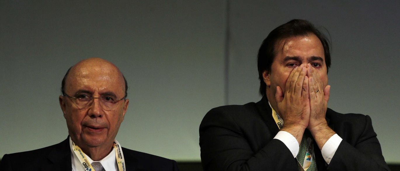 O Palácio do Planalto já não trabalha com a hipótese de ter o ministro da Fazenda, Henrique Meirelles, ou o presidente da Câmara, Rodrigo Maia (DEM-RJ), como candidato governista nas eleições de 2018; na pesquisa Datafolha divulgada nesta quarta-feira ambos marcaram apenas 1% (Foto: Charles Nisz) O Palácio do Planalto já não trabalha com a hipótese de ter o ministro da Fazenda, Henrique Meirelles, ou o presidente da Câmara, Rodrigo Maia (DEM-RJ), como candidato governista nas eleições de 2018; na pesquisa Datafolha divulgada nesta quarta-feira ambos marcaram apenas 1%
