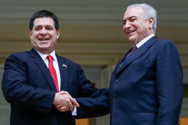 Levantamento da Folha diz que continua crescendo a migração de empresas brasileiras para o Paraguai, apesar do trabalho quase escravo entrar em vigor desde 11 de novembro com a reforma trabalhista. Michel Temer deverá ser homenageado em Asunción como 'melhor presidente que o Paraguai já teve' (Foto: Esmael Morais) Levantamento da Folha diz que continua crescendo a migração de empresas brasileiras para o Paraguai, apesar do trabalho quase escravo entrar em vigor desde 11 de novembro com a reforma trabalhista. Michel Temer deverá ser homenageado em Asunción como 'melhor presidente que o Paraguai já teve'