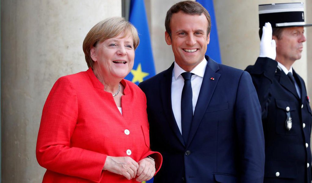 Angela Merkel e Emmanuel Macron (Foto: Leonardo Lucena) Angela Merkel e Emmanuel Macron