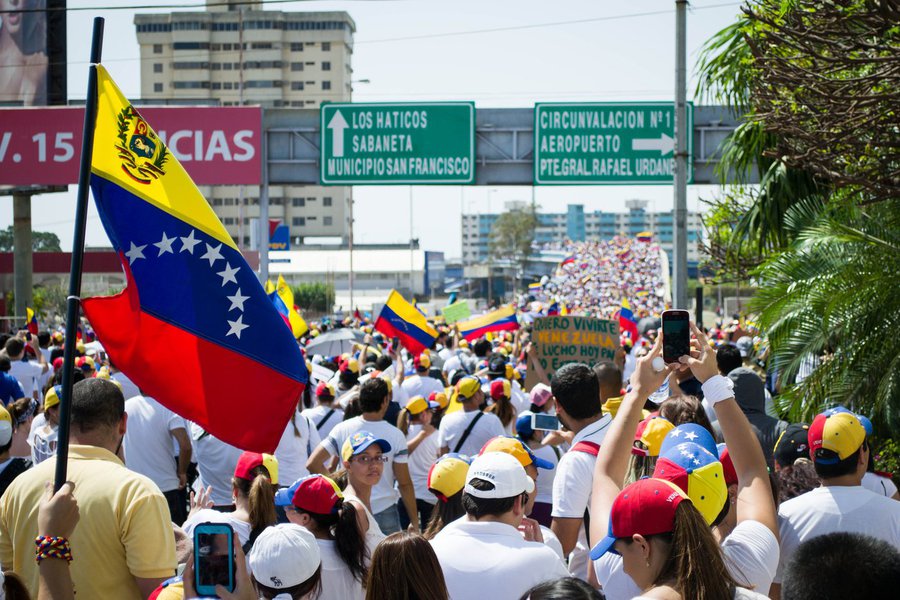 O povo brasileiro vem sendo bombardeado todos os dias por mentiras e manipulações da grande imprensa sobre a situação da Venezuela. As acusações vão desde um governo ditatorial, migração em massa, povo passando fome e até violência diária nas ruas da policia contra todos (Foto: João Pedro Stédile) O povo brasileiro vem sendo bombardeado todos os dias por mentiras e manipulações da grande imprensa sobre a situação da Venezuela. As acusações vão desde um governo ditatorial, migração em massa, povo passando fome e até violência diária nas ruas da policia contra todos