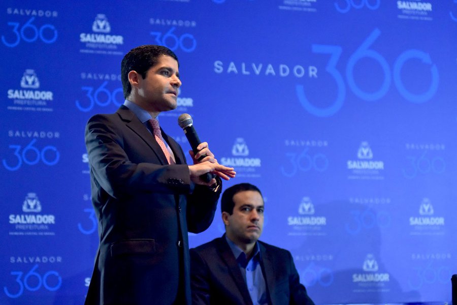 O prefeito ACM Neto (DEM) lançou nesta segunda-feira o Salvador 360, "o maior e mais audacioso programa de planejamento para impulsionar o desenvolvimento econômico de Salvador, que busca soluções para problemas que atrapalham a geração de emprego e renda na cidade"; "Salvador é uma cidade pobre e com economia pouco diversificada. Com o Salvador 360, não estamos lançando qualquer ideia mirabolante. A iniciativa é mais ampla e estruturada e reúne todas as ações municipais na área de desenvolvimento econômico. O objetivo é claro: fazer com que Salvador possa superar a crise econômica antes do resto do Brasil e enfrentar o principal problema social da cidade, que é o desemprego", disse ACM (Foto: Romulo Faro) O prefeito ACM Neto (DEM) lançou nesta segunda-feira o Salvador 360, "o maior e mais audacioso programa de planejamento para impulsionar o desenvolvimento econômico de Salvador, que busca soluções para problemas que atrapalham a geração de emprego e renda na cidade"; "Salvador é uma cidade pobre e com economia pouco diversificada. Com o Salvador 360, não estamos lançando qualquer ideia mirabolante. A iniciativa é mais ampla e estruturada e reúne todas as ações municipais na área de desenvolvimento econômico. O objetivo é claro: fazer com que Salvador possa superar a crise econômica antes do resto do Brasil e enfrentar o principal problema social da cidade, que é o desemprego", disse ACM