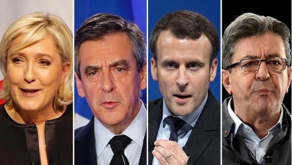 Cerca de 47 milhões de franceses foram convocados para a primeiro turno da eleição presidencial neste domingo (22); diante da ameaça de atentados e três dias após um ataque visando policiais em pleno centro de Paris, um forte esquema de segurança foi montado; temendo novos ataques, as autoridades mobilizaram mais 50 mil policiais e agentes em todo o país, apoiados por 7 mil militares; "Nada deve prejudicar o encontro democrático", afirmou o primeiro-ministro Bernard Cazeneuve; favoritos são Marine Le Pen, de 48 anos (Frente Nacional, extrema-direita), François Fillon, de 63 anos (Os Republicanos, direita), Emmanuel Macron, 39 anos (Em Marcha!, centro), Jean-Luc Mélenchon, 65 anos (França Insubmissa, esquerda radical) (Foto: Aquiles Lins) Cerca de 47 milhões de franceses foram convocados para a primeiro turno da eleição presidencial neste domingo (22); diante da ameaça de atentados e três dias após um ataque visando policiais em pleno centro de Paris, um forte esquema de segurança foi montado; temendo novos ataques, as autoridades mobilizaram mais 50 mil policiais e agentes em todo o país, apoiados por 7 mil militares; "Nada deve prejudicar o encontro democrático", afirmou o primeiro-ministro Bernard Cazeneuve; favoritos são Marine Le Pen, de 48 anos (Frente Nacional, extrema-direita), François Fillon, de 63 anos (Os Republicanos, direita), Emmanuel Macron, 39 anos (Em Marcha!, centro), Jean-Luc Mélenchon, 65 anos (França Insubmissa, esquerda radical)