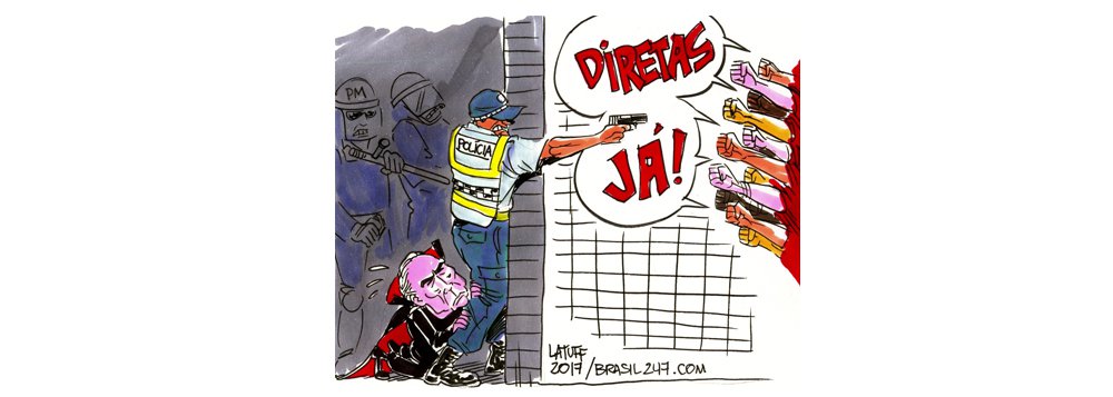 Cartunista Latuff retrata a tragédia brasileira: um governo ilegítimo que usa a polícia e as Forças Armadas para se proteger da população, golpeada por políticos corruptos (Foto: Leonardo Attuch) Cartunista Latuff retrata a tragédia brasileira: um governo ilegítimo que usa a polícia e as Forças Armadas para se proteger da população, golpeada por políticos corruptos