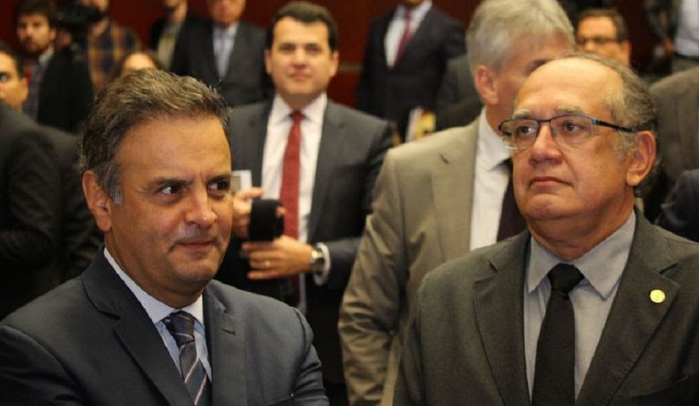 "As declarações de Gilmar confundem a mente de quem quer acreditar que o papel da Justiça Eleitoral é punir exemplarmente as ilegalidades que tenham comprometido qualquer eleição", diz reportagem do Jornal GGN; em entrevista à BBC Brasil, o presidente do TSE, "como em outras oportunidades, tentou aliviar o lado de Temer responsabilizando a cabeça da chapa, Dilma Rousseff, por eventuais abusos que venham a ser provados durante o julgamento da ação que visa a cassação da dupla eleita em 2014", aponta ainda o texto (Foto: Gisele Federicce) "As declarações de Gilmar confundem a mente de quem quer acreditar que o papel da Justiça Eleitoral é punir exemplarmente as ilegalidades que tenham comprometido qualquer eleição", diz reportagem do Jornal GGN; em entrevista à BBC Brasil, o presidente do TSE, "como em outras oportunidades, tentou aliviar o lado de Temer responsabilizando a cabeça da chapa, Dilma Rousseff, por eventuais abusos que venham a ser provados durante o julgamento da ação que visa a cassação da dupla eleita em 2014", aponta ainda o texto