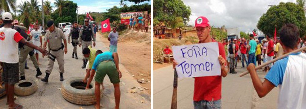 Integrantes do Movimento dos Trabalhadores Rurais Sem Terra (MST) e do Movimento de Libertação dos Sem Terra (MLST) interditaram a rodovia AL-465 em Japaratinga, Litoral Norte, que liga Alagoas a Pernambuco; manifestantes protestam contra o governo Michel Temer (PMDB), a reforma da previdência e cobram melhorias estruturais para os acampamentos Cais e Paraíso (Foto: Voney Malta) Integrantes do Movimento dos Trabalhadores Rurais Sem Terra (MST) e do Movimento de Libertação dos Sem Terra (MLST) interditaram a rodovia AL-465 em Japaratinga, Litoral Norte, que liga Alagoas a Pernambuco; manifestantes protestam contra o governo Michel Temer (PMDB), a reforma da previdência e cobram melhorias estruturais para os acampamentos Cais e Paraíso