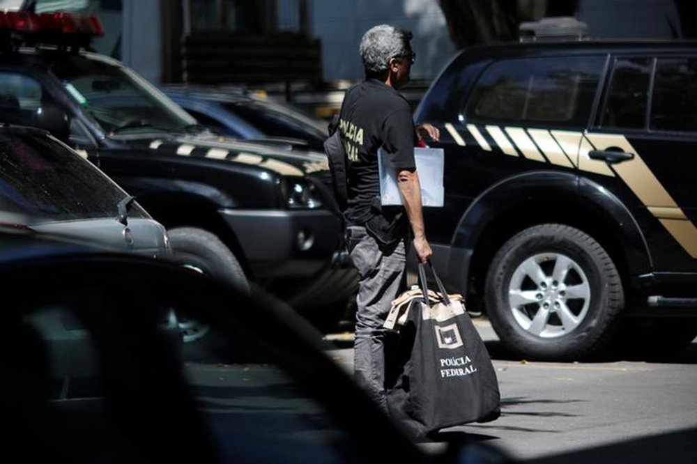Agente da Polícia Federal durante uma operação no Rio de Janeiro. 26/01/2017 REUTERS/Ueslei Marcelino (Foto: Voney Malta) Agente da Polícia Federal durante uma operação no Rio de Janeiro. 26/01/2017 REUTERS/Ueslei Marcelino
