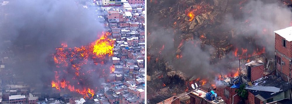 Um incêndio de grandes proporções atinge a comunidade de Paraisópolis, na zona sul da capital paulista; segundo o Corpo de Bombeiros, uma vítima foi socorrida por inalação de fumaça; de acordo com a corporação, cerca de 50 barracos foram atingidos (Foto: Leonardo Lucena) Um incêndio de grandes proporções atinge a comunidade de Paraisópolis, na zona sul da capital paulista; segundo o Corpo de Bombeiros, uma vítima foi socorrida por inalação de fumaça; de acordo com a corporação, cerca de 50 barracos foram atingidos