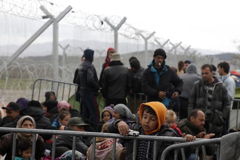 Imigrantes na fronteira da Grécia com a Macedônia. 7/3/2016. REUTERS/Marko Djurica (Foto: Aquiles Lins) Imigrantes na fronteira da Grécia com a Macedônia. 7/3/2016. REUTERS/Marko Djurica