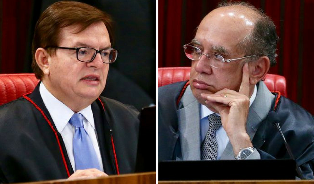 O primeiro dia do julgamento da ação que pede a cassação da chapa de reeleição de Dilma Rousseff-Michel Temer foi marcado pelo embate entre o relator do processo, ministro Herman Benjamin, e o presidente do Tribunal Superior Eleitoral (TSE), ministro Gilmar Mendes; ontem, enquanto Benjamin defendia a importância da ação, Gilmar tomou a palavra para pedir “cautela”; apesar da polarização, os ministros ainda não apresentaram seus votos; o vice-procurador-geral eleitoral Nicolao Dino já recomendou a cassação da chapa do PT-PMDB, acusada pelo PSDB, logo após as eleições de 2014, de praticar abuso de poder econômico e político (Foto: Giuliana Miranda) O primeiro dia do julgamento da ação que pede a cassação da chapa de reeleição de Dilma Rousseff-Michel Temer foi marcado pelo embate entre o relator do processo, ministro Herman Benjamin, e o presidente do Tribunal Superior Eleitoral (TSE), ministro Gilmar Mendes; ontem, enquanto Benjamin defendia a importância da ação, Gilmar tomou a palavra para pedir “cautela”; apesar da polarização, os ministros ainda não apresentaram seus votos; o vice-procurador-geral eleitoral Nicolao Dino já recomendou a cassação da chapa do PT-PMDB, acusada pelo PSDB, logo após as eleições de 2014, de praticar abuso de poder econômico e político