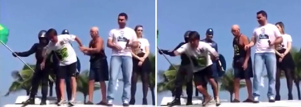 Durante comício na Barra da Tijuca, no Rio, o deputado Jair Bolsonaro (PSC-RJ), réu no STF por apologia ao estupro e alvo de ação no Conselho de Ética por apologia à tortura, tentou dar uma de rockstar e arriscou um "mosh", se jogando contra a plateia que o acompanhava; só que o público não segurou e o parlamentar foi ao chão; vídeo viralizou nas redes sociais; assista (Foto: Aquiles Lins) Durante comício na Barra da Tijuca, no Rio, o deputado Jair Bolsonaro (PSC-RJ), réu no STF por apologia ao estupro e alvo de ação no Conselho de Ética por apologia à tortura, tentou dar uma de rockstar e arriscou um "mosh", se jogando contra a plateia que o acompanhava; só que o público não segurou e o parlamentar foi ao chão; vídeo viralizou nas redes sociais; assista