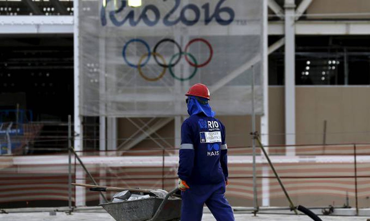 O Tribunal Regional do Trabalho da 1ª Região, no Rio de Janeiro, determinou que o Comitê Organizador dos Jogos Olímpicos Rio 2016 e as empresas que atuam no evento não causem embaraço à fiscalização realizada por órgãos trabalhistas; medida é uma concessão parcial do mandado de segurança, com pedido de liminar, ajuizado pelo Ministério Público do Trabalho no Rio de Janeiro; o pedido de tutela antecipada, ocasionado por irregularidades constatadas na Olimpíada, não foi aceito pelo tribunal, que julgou o pedido de urgência uma pretensão óbvia de que se cumpra a lei, portanto, desnecessária (Foto: Romulo Faro) O Tribunal Regional do Trabalho da 1ª Região, no Rio de Janeiro, determinou que o Comitê Organizador dos Jogos Olímpicos Rio 2016 e as empresas que atuam no evento não causem embaraço à fiscalização realizada por órgãos trabalhistas; medida é uma concessão parcial do mandado de segurança, com pedido de liminar, ajuizado pelo Ministério Público do Trabalho no Rio de Janeiro; o pedido de tutela antecipada, ocasionado por irregularidades constatadas na Olimpíada, não foi aceito pelo tribunal, que julgou o pedido de urgência uma pretensão óbvia de que se cumpra a lei, portanto, desnecessária
