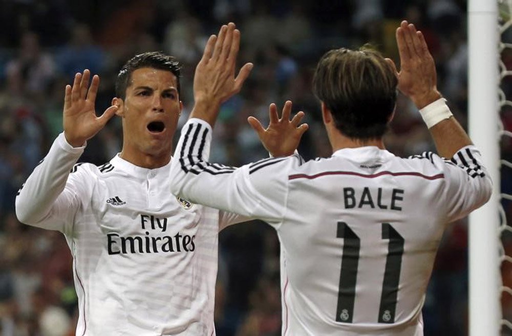 Cristiano Ronaldo e Bale comemorando gol em partida do Real Madrid, na Espanha. 05/10/2015 REUTERS/Sergio Perez (Foto: Gisele Federicce) Cristiano Ronaldo e Bale comemorando gol em partida do Real Madrid, na Espanha. 05/10/2015 REUTERS/Sergio Perez