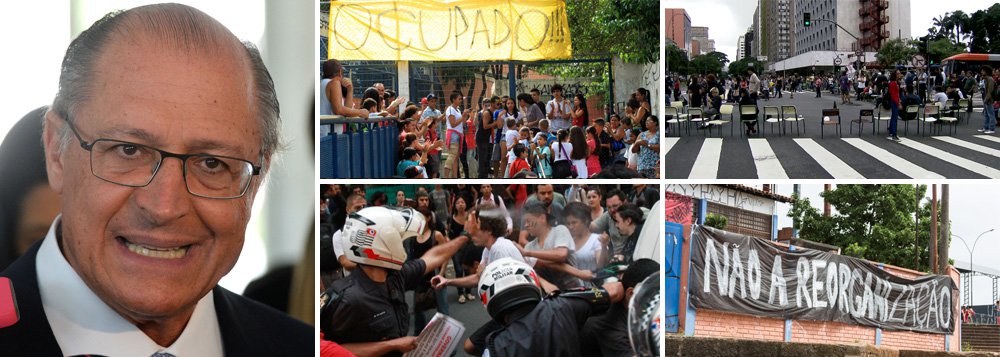 Secretaria de Educação do Estado de São Paulo anunciou que o decreto sobre a "reorganização" escolar, que prevê fechar 93 unidades, deverá ser publicado nesta terça-feira 1º, apesar da ocupação de nada menos que 204 escolas, segundo a Apeoesp, por estudantes secundaristas até esta segunda-feira, quando os atos completam três semanas; em reunião com dirigentes de ensino na manhã deste domingo, representantes do governo Geraldo Alckmin (PSDB) falaram em organizar "ações de guerra" e "desmoralizar" o movimento, com a ajuda da PM; nesta manhã, um grupo de alunos bloqueou, com carteiras e cartazes, a Avenida Brigadeiro Faria Lima, na zona oeste da capital paulista, por cerca de quatros horas; estudantes dizem querer diálogo, mas Alckmin mantém seu plano sem se perturbar (Foto: Ana Pupulin) Secretaria de Educação do Estado de São Paulo anunciou que o decreto sobre a "reorganização" escolar, que prevê fechar 93 unidades, deverá ser publicado nesta terça-feira 1º, apesar da ocupação de nada menos que 204 escolas, segundo a Apeoesp, por estudantes secundaristas até esta segunda-feira, quando os atos completam três semanas; em reunião com dirigentes de ensino na manhã deste domingo, representantes do governo Geraldo Alckmin (PSDB) falaram em organizar "ações de guerra" e "desmoralizar" o movimento, com a ajuda da PM; nesta manhã, um grupo de alunos bloqueou, com carteiras e cartazes, a Avenida Brigadeiro Faria Lima, na zona oeste da capital paulista, por cerca de quatros horas; estudantes dizem querer diálogo, mas Alckmin mantém seu plano sem se perturbar