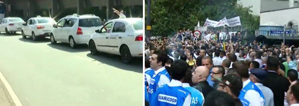 Taxistas ocupam hoje (4) a pista de acesso à avenida Washington Luiz, próximo ao aeroporto de Congonhas, zona sul de São Paulo, em protesto contra a possibilidade de regulamentação de aplicativos de transporte, entre eles, o Uber; manifestantes pretendem seguir para a rua Maria Paula, em frente ao prédio da Câmara dos Vereadores, na região central, onde alguns taxistas já ocupam a faixa esquerda da via que tem sentido único rumo à Praça da Sé; ato tem o objetivo de pressionar os parlamentares porque às 15h deve começar a sessão de votação do projeto de lei 421 de 2015, do vereador José Pólice Neto (PSD), que trata da regulamentação de aplicativos de transporte individual, inclusive, o Uber (Foto: Paulo Emílio) Taxistas ocupam hoje (4) a pista de acesso à avenida Washington Luiz, próximo ao aeroporto de Congonhas, zona sul de São Paulo, em protesto contra a possibilidade de regulamentação de aplicativos de transporte, entre eles, o Uber; manifestantes pretendem seguir para a rua Maria Paula, em frente ao prédio da Câmara dos Vereadores, na região central, onde alguns taxistas já ocupam a faixa esquerda da via que tem sentido único rumo à Praça da Sé; ato tem o objetivo de pressionar os parlamentares porque às 15h deve começar a sessão de votação do projeto de lei 421 de 2015, do vereador José Pólice Neto (PSD), que trata da regulamentação de aplicativos de transporte individual, inclusive, o Uber