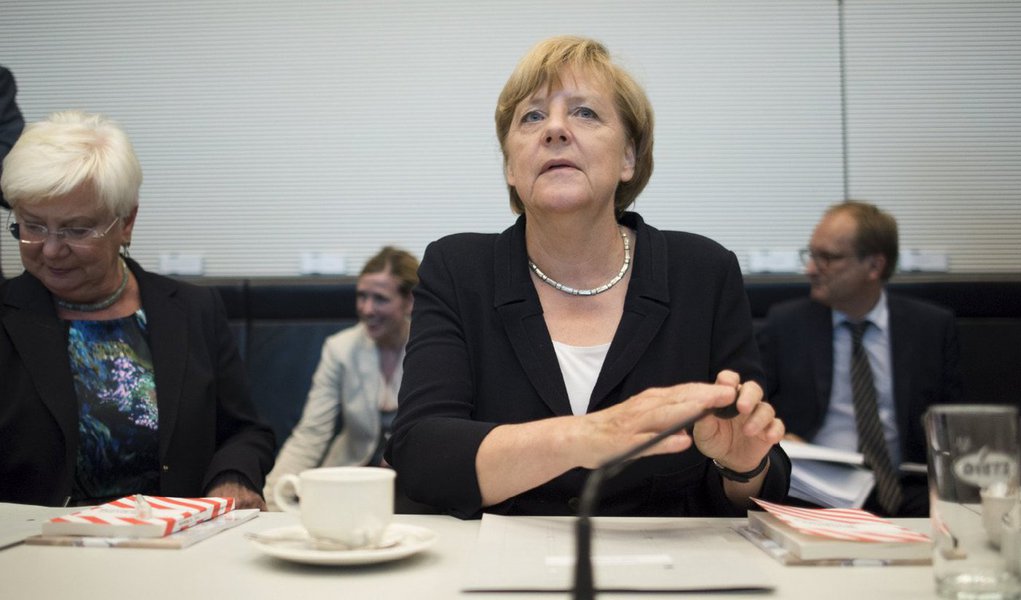 Chanceler alemã, Angela Merkel, vai pressionar o Brasil nesta semana para garantir melhores condições de investimentos para empresas alemãs que colocaram 19 bilhões de euros na economia brasileira, mas enfrentam alta nos custos de energia, disseram autoridades do governo alemão (Foto: Gisele Federicce) Chanceler alemã, Angela Merkel, vai pressionar o Brasil nesta semana para garantir melhores condições de investimentos para empresas alemãs que colocaram 19 bilhões de euros na economia brasileira, mas enfrentam alta nos custos de energia, disseram autoridades do governo alemão