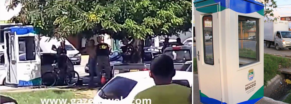 Homens da Força Nacional de Segurança Pública (FNSP) prenderam um jovem no momento em que dstruía uma cabine da Superintendência Municipal de Transportes e Trânsito de Maceió (SMTT); ele chuta várias vezes a estrutura e tenta derrubá-la; em seguida pega um martelo na bolsa e retorna à cabine, onde quebra todos os vidros; ação foi registrada em um vídeo (Foto: Voney Malta) Homens da Força Nacional de Segurança Pública (FNSP) prenderam um jovem no momento em que dstruía uma cabine da Superintendência Municipal de Transportes e Trânsito de Maceió (SMTT); ele chuta várias vezes a estrutura e tenta derrubá-la; em seguida pega um martelo na bolsa e retorna à cabine, onde quebra todos os vidros; ação foi registrada em um vídeo