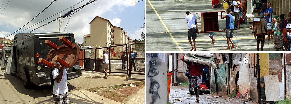 Algumas famílias já começam a deixar pacificamente o Residencial Guadalupe, do Programa Minha Casa, Minha Vida, ocupado na noite do último dia 9 por cerca de 200 famílias que moram principalmente na favela Terra Prometida, que fica ao lado; para cumprir o mandado de reintegração de posse, a PM montou um grande esquema de segurança, com mais de 200 agentes do Batalhão de Choque, de Ações com Cães e do Batalhão de Operações Especiais (Bope) e o apoio de um helicóptero (Foto: Leonardo Lucena) Algumas famílias já começam a deixar pacificamente o Residencial Guadalupe, do Programa Minha Casa, Minha Vida, ocupado na noite do último dia 9 por cerca de 200 famílias que moram principalmente na favela Terra Prometida, que fica ao lado; para cumprir o mandado de reintegração de posse, a PM montou um grande esquema de segurança, com mais de 200 agentes do Batalhão de Choque, de Ações com Cães e do Batalhão de Operações Especiais (Bope) e o apoio de um helicóptero