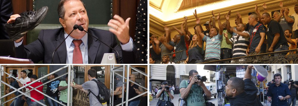 Com brigas do lado de fora e torcidas organizadas nas galerias, a CPI dos Ônibus começou seus trabalhos num ambiente bastante confuso; presidente da comissão, vereador Chiquinho Brazão, do PMDB, exibiu sapato lançado contra ele; manifestantes viraram de costas quando ele começou a falar; cinegrafista da Band News foi agredido; ocupação e acampamento acabaram, mas bagunça nunca não foi tão grande (Foto: Marco Damiani) Com brigas do lado de fora e torcidas organizadas nas galerias, a CPI dos Ônibus começou seus trabalhos num ambiente bastante confuso; presidente da comissão, vereador Chiquinho Brazão, do PMDB, exibiu sapato lançado contra ele; manifestantes viraram de costas quando ele começou a falar; cinegrafista da Band News foi agredido; ocupação e acampamento acabaram, mas bagunça nunca não foi tão grande