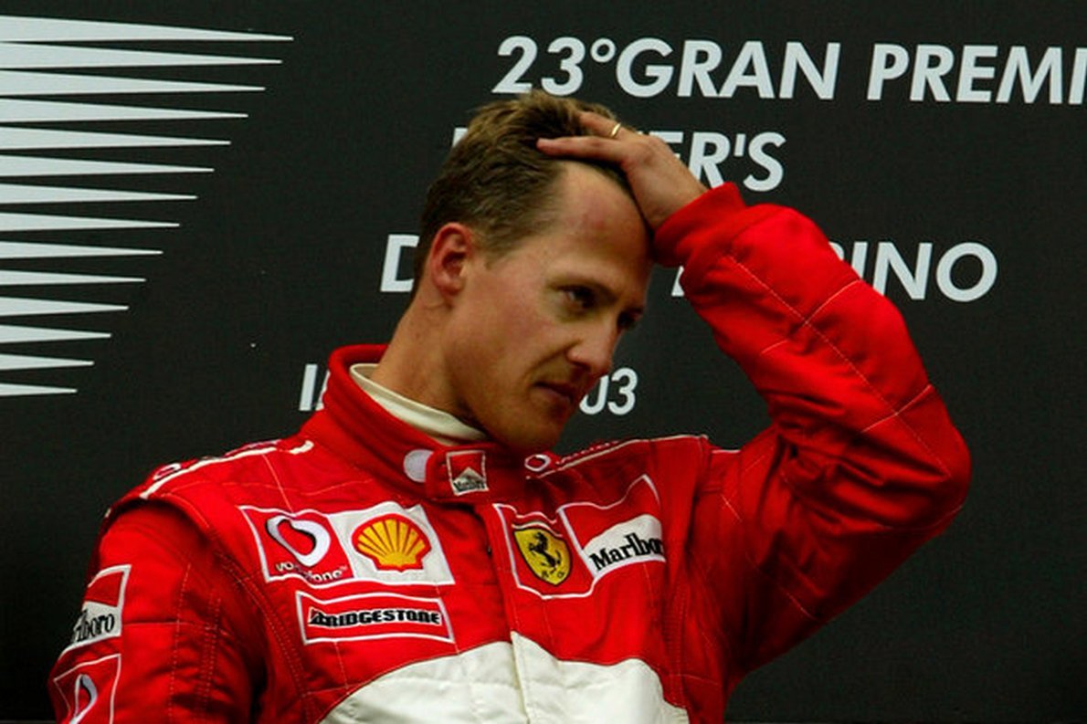 Ferrari's Formula One world champion driver Michael Schumacher of Germany shows his emotions on the winners podium after victory in the San Marino Grand Prix at Imola April 20, 2003. [The mother of Michael and Ralf Schumacher died in hospital in Cologne, (Foto: José Barbacena) Ferrari's Formula One world champion driver Michael Schumacher of Germany shows his emotions on the winners podium after victory in the San Marino Grand Prix at Imola April 20, 2003. [The mother of Michael and Ralf Schumacher died in hospital in Cologne,