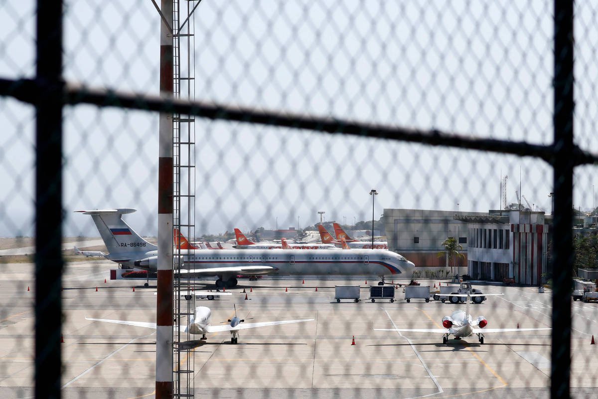 Aviões da Força Aérea da Rússia aterrissam na Venezuela carregando tropas (Foto: Reuters) Aviões da Força Aérea da Rússia aterrissam na Venezuela carregando tropas