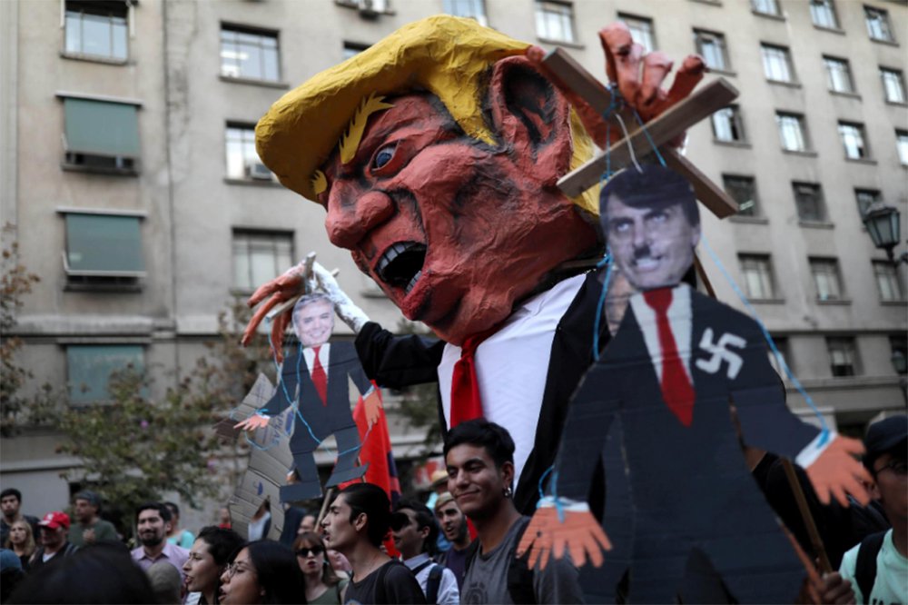 Polícia chilena reprime protesto contra visita de Bolsonaro (Foto: REUTERS/Pablo Sanhueza) Polícia chilena reprime protesto contra visita de Bolsonaro