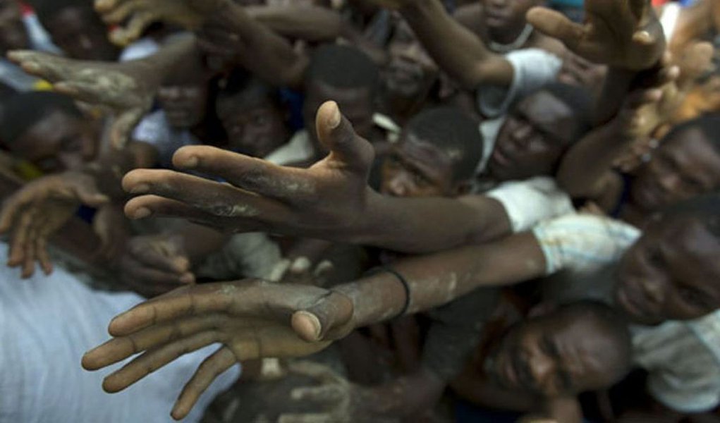Governo dará vistos a mais 2,4 mil haitianos (Foto: Divulgação/Ramon Espinosa) Governo dará vistos a mais 2,4 mil haitianos