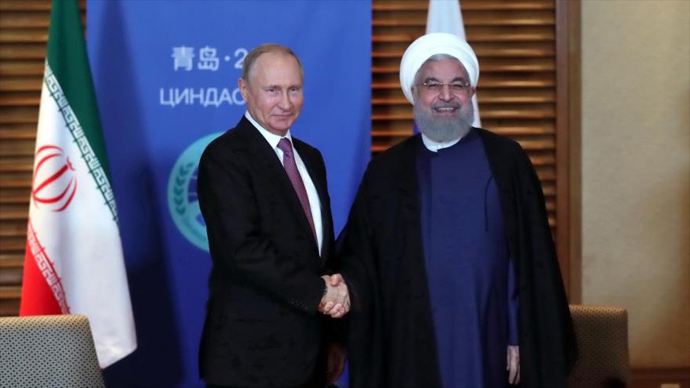 Em encontro com Putin, presidente do Irã diz que saída dos EUA do acordo nuclear é ilegal Em encontro com Putin, presidente do Irã diz que saída dos EUA do acordo nuclear é ilegal
