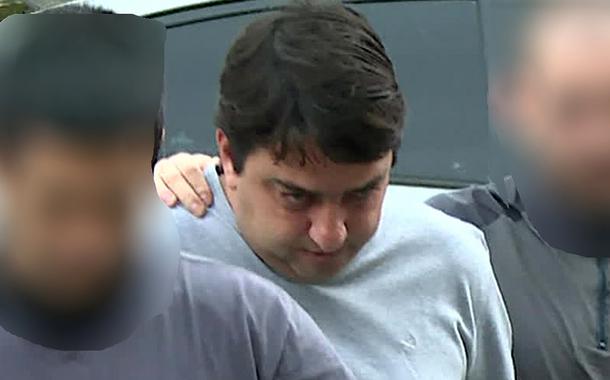 Bruno Pupe Cancella, um dos presos em operação contra a milícia, chega à Cidade da Polícia (Foto: Reprodução/GloboNews) Bruno Pupe Cancella, um dos presos em operação contra a milícia, chega à Cidade da Polícia