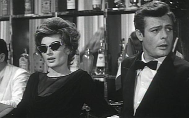 Marcello (Marcello Mastroianni) e Maddalena (Anouk Aimée) em La Dolce Vita, impossivelmente chiques e cool, são como a Última Mulher e o Último Homem antes do dilúvio do "espalhafato vulgar" (Foto: Divulgação) Marcello (Marcello Mastroianni) e Maddalena (Anouk Aimée) em La Dolce Vita, impossivelmente chiques e cool, são como a Última Mulher e o Último Homem antes do dilúvio do "espalhafato vulgar"