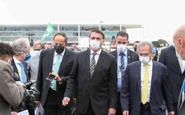 Bolsonaro, ministros e empresários caminham do Palácio do Planalto até o STF (Foto: Marcos Corrêa/Presidência da República) Bolsonaro, ministros e empresários caminham do Palácio do Planalto até o STF