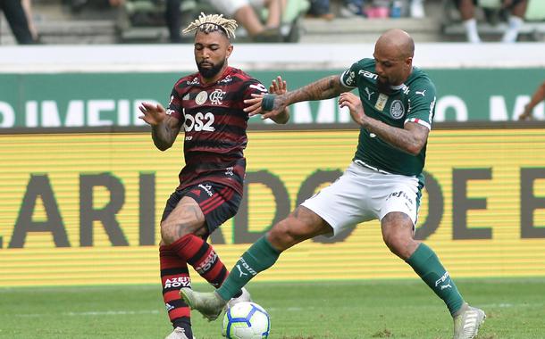 Gabigol (Flamengo) e Felipe Melo (Palmeiras) (Foto: Bruno Ulivieri/AGIF) Gabigol (Flamengo) e Felipe Melo (Palmeiras)