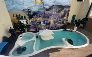Painel com reprodução da cidade de Jerusalém na casa do traficante Peixão (Foto: Reprodução) Painel com reprodução da cidade de Jerusalém na casa do traficante Peixão