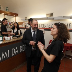 People socialize in the GP2 bar in Rome April 7. The bar honors Giovanni Paolo II, or Pope John Paul II, and seeks to provide a place for Catholic youth to gather in a safe environment, enjoy a beer or coffee and share in the joys of being Christian. The Italian words on the counter say 'Give me to drink,' a scriptural reference to Jesus’ words to the woman at the well. People socialize in the GP2 bar in Rome April 7. The bar honors Giovanni Paolo II, or Pope John Paul II, and seeks to provide a place for Catholic youth to gather in a safe environment, enjoy a beer or coffee and share in the joys of being Christian. The Italian words on the counter say 'Give me to drink,' a scriptural reference to Jesus’ words to the woman at the well.