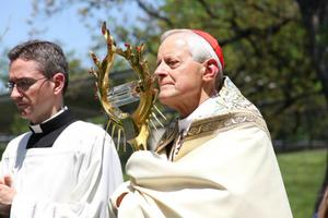 Cardinal Donald Wuerl leading a procession with a relic of St. John Paul II. Cardinal Donald Wuerl leading a procession with a relic of St. John Paul II.