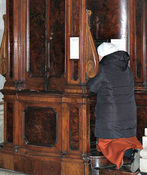 A woman goes to confession at the Basilica of St. Mary Major`s during the during the Vigil for Life in March. A woman goes to confession at the Basilica of St. Mary Major`s during the during the Vigil for Life in March.