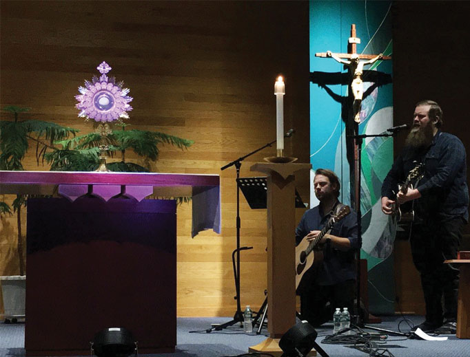 Lee Roessler and Dave Moore play music during adoration Sept. 26 in Rochester, N.Y. Lee Roessler and Dave Moore play music during adoration Sept. 26 in Rochester, N.Y.