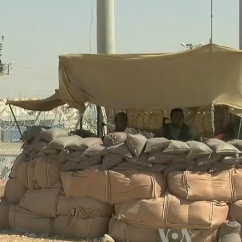 Soldiers stand guard outside at a Syrian refugee center on the Turkish border, about 50 miles from Aleppo, Syria, in August 2012. Soldiers stand guard outside at a Syrian refugee center on the Turkish border, about 50 miles from Aleppo, Syria, in August 2012.