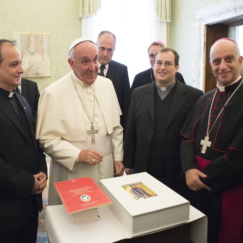 Pope Francis is presented with the 'Gospels of Mercy' in Vatican City on Dec. 3.
Pope Francis is presented with the 'Gospels of Mercy' in Vatican City on Dec. 3.