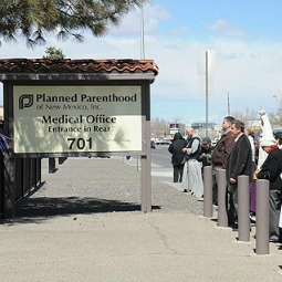 Pro-life advocates pray March 20 in front of the Planned Parenthood Surgical Center in Albuquerque. Pro-life advocates pray March 20 in front of the Planned Parenthood Surgical Center in Albuquerque.