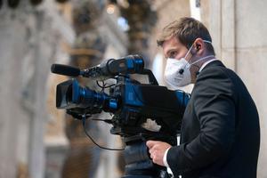 A Vatican TV (CTV) cameraman attends Pope Francis' Easter Mass at St. Peter's Basilica on April 12, 2020. A Vatican TV (CTV) cameraman attends Pope Francis' Easter Mass at St. Peter's Basilica on April 12, 2020.