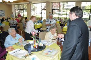 Above, Archbishop Christophe Pierre greets residents of the Little Sisters’ St. Jeanne Jugan Residence in San Pedro, California, June 7; below are more highlights of the special visit: Mother Marguerite McCarthy, Sisters Pauline, Maureen and Clotilde, and special guests welcome Archbishop Pierre to the home. Archbishop Pierre and Mother Marguerite enjoy a banner of the Little Sisters of the Poor celebrating 150 years in America; Mother Marguerite introduces Archbishop Pierre to the breakfast in his honor; Sisters Cecilia, Pauline and Isabel (left), Archbishop Christophe Pierre (middle), Mother Marguerite and Sisters Maureen, Clotilde and Grace (right) pose for a group photo; Archbishop Pierre thanks Jean Jack, the resident who welcomed him, and addresses the residents. A portrait of St. Jeanne Jugan is seen in the background of several photos. Above, Archbishop Christophe Pierre greets residents of the Little Sisters’ St. Jeanne Jugan Residence in San Pedro, California, June 7; below are more highlights of the special visit: Mother Marguerite McCarthy, Sisters Pauline, Maureen and Clotilde, and special guests welcome Archbishop Pierre to the home. Archbishop Pierre and Mother Marguerite enjoy a banner of the Little Sisters of the Poor celebrating 150 years in America; Mother Marguerite introduces Archbishop Pierre to the breakfast in his honor; Sisters Cecilia, Pauline and Isabel (left), Archbishop Christophe Pierre (middle), Mother Marguerite and Sisters Maureen, Clotilde and Grace (right) pose for a group photo; Archbishop Pierre thanks Jean Jack, the resident who welcomed him, and addresses the residents. A portrait of St. Jeanne Jugan is seen in the background of several photos.