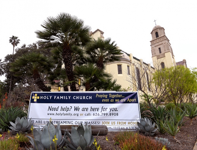 A sign hangs outside Holy Family Catholic Church Easter morning, April 12, in South Pasadena, California.
A sign hangs outside Holy Family Catholic Church Easter morning, April 12, in South Pasadena, California.