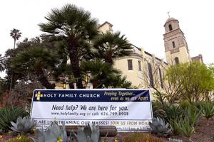 A sign hangs outside Holy Family Catholic Church Easter morning, April 12, in South Pasadena, California.
A sign hangs outside Holy Family Catholic Church Easter morning, April 12, in South Pasadena, California.