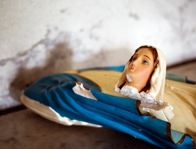 Broken statue of Mary. Broken statue of Mary.