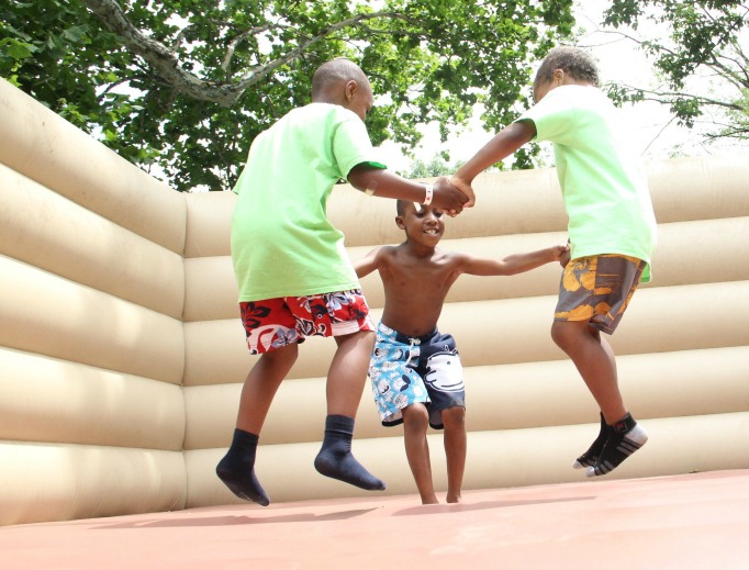Kids play at an Out of School Time picnic in July of 2014 for over 1,000 children at Neshaminy Shore Picnic Park, sponsored by Catholic Social Services of Philadelphia. Kids play at an Out of School Time picnic in July of 2014 for over 1,000 children at Neshaminy Shore Picnic Park, sponsored by Catholic Social Services of Philadelphia.