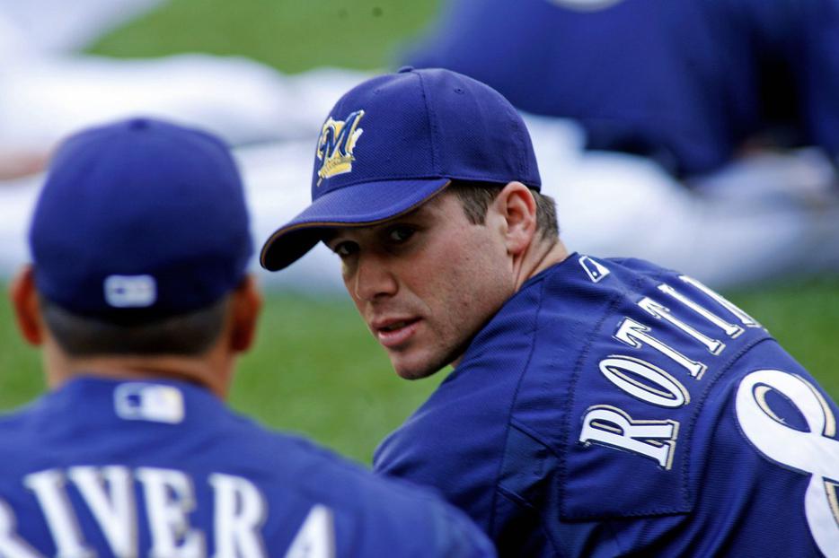 Then-Milwaukee Brewers rookie Vinny Rottino, right, stretches before batting practice before the Brewers' baseball game against the Florida Marlins Sept. 1, 2006, in Milwaukee. Then-Milwaukee Brewers rookie Vinny Rottino, right, stretches before batting practice before the Brewers' baseball game against the Florida Marlins Sept. 1, 2006, in Milwaukee.