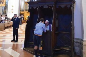 Pope Francis hears confession at the papal Basilica of St. Mary of the Angels in Assisi, Italy, on Aug. 4. Pope Francis hears confession at the papal Basilica of St. Mary of the Angels in Assisi, Italy, on Aug. 4.